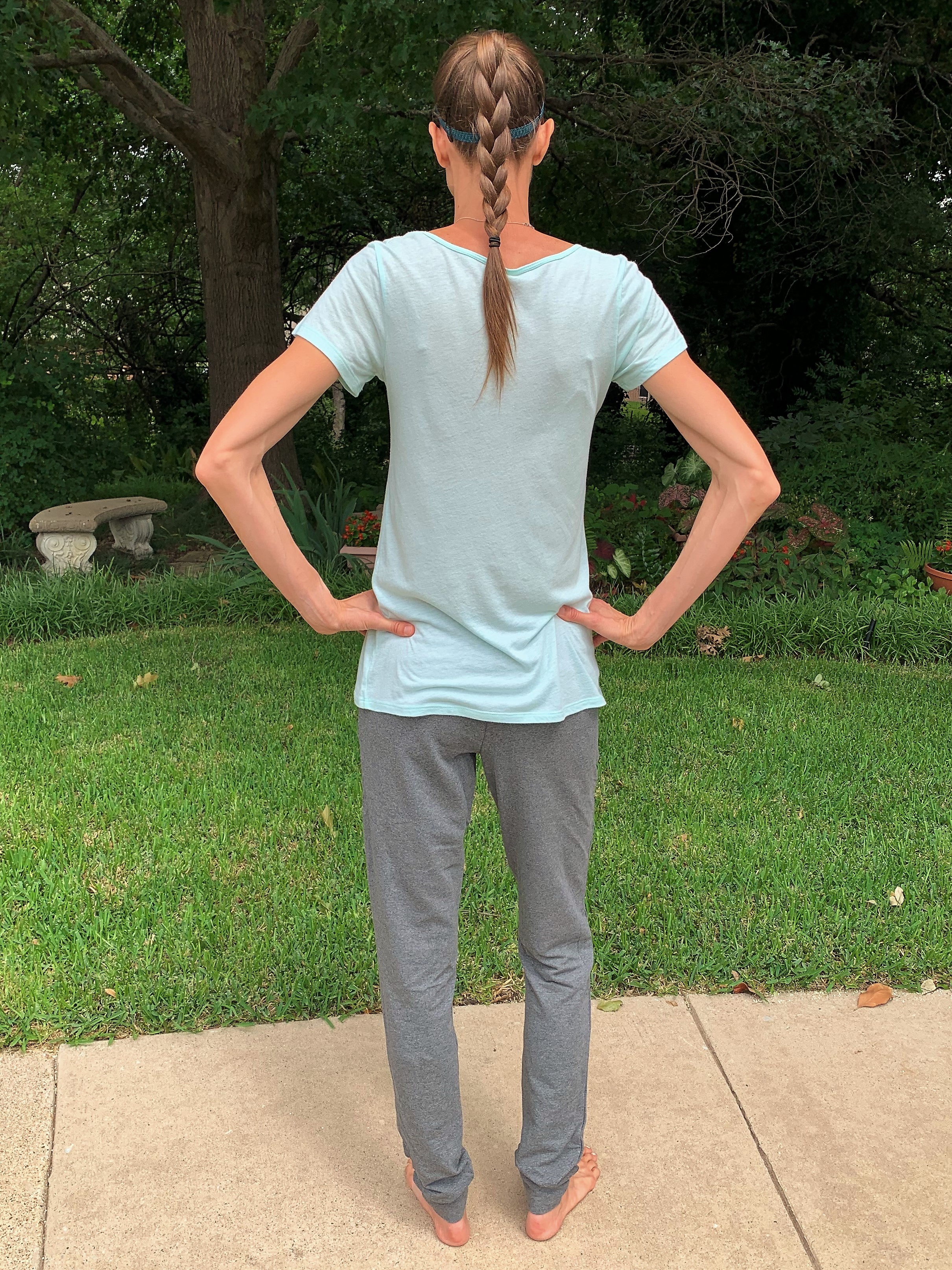 Back view of these tall gray jogger sweats.